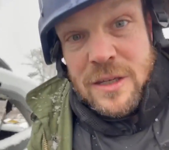 A Brave Sun Man Takes Cover From Russian Shells Exploding On The Front Line As A Ukrainian Soldier Displays The Trophies Of His Dead Enemies The Sun Editor Jerome Starkey On The Front Lines In Ukraine