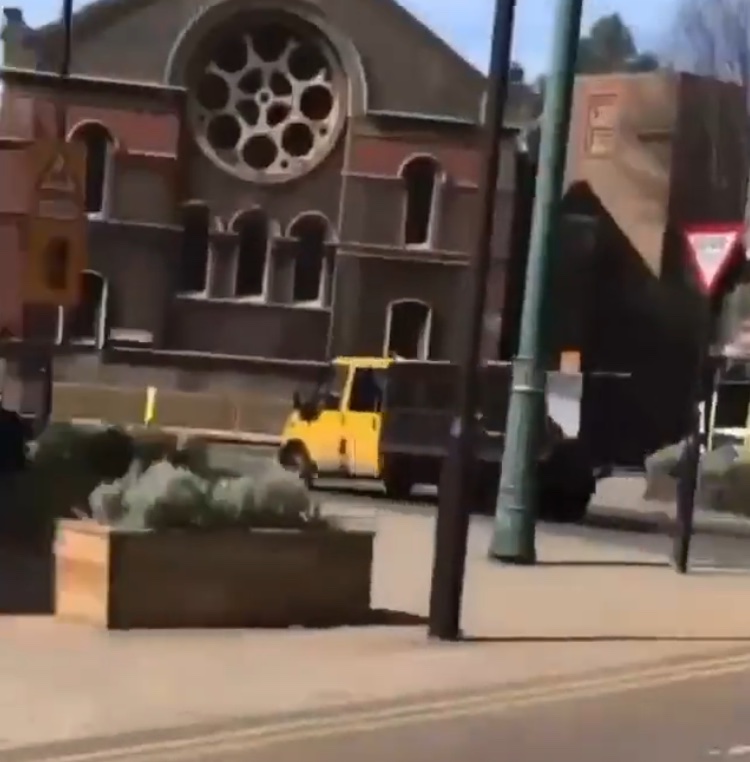 A Shocking Video Shows A Garbage Truck Reversing At Speed As A Police Patrol Car Rams On A London Street. The Driver Of The Truck Fled The Scene